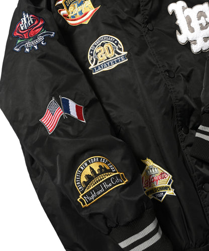 LFYT All Over Emblem Stain Varsity Jacket